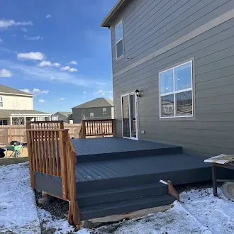 Raised deck and porch with railings and stairs