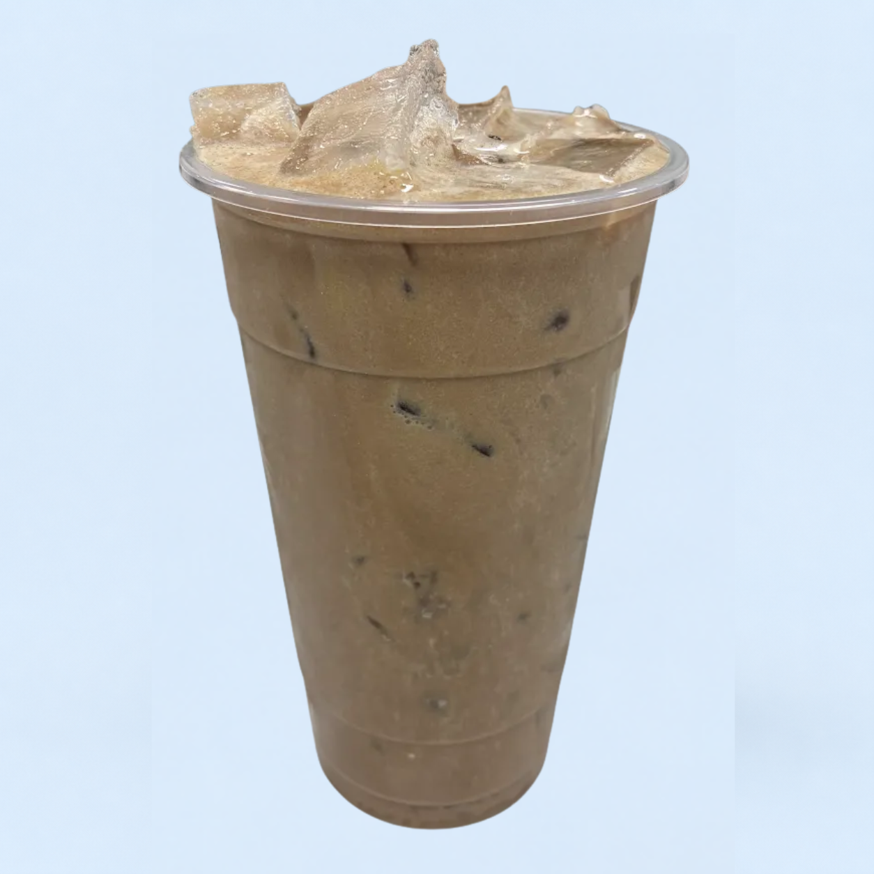 Caramel Macchiato protein coffee in a clear cup with a caramel swirl