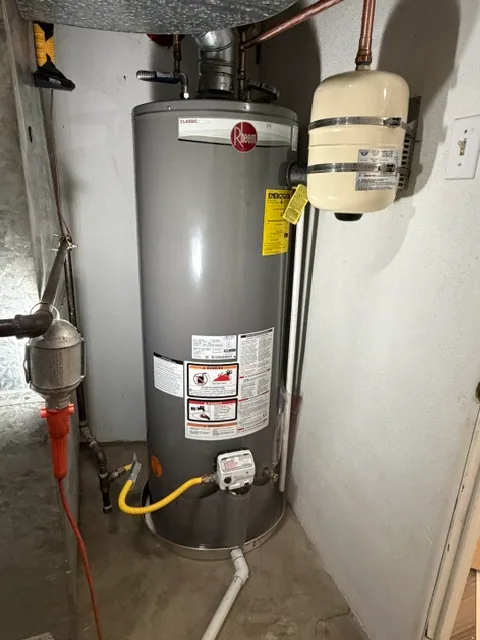 Newly installed water heater, up to code, by Summit Peak Plumbing