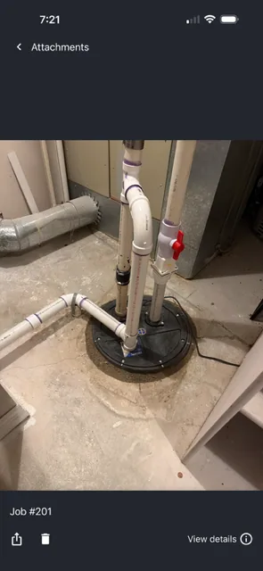 Completed sewage ejector pit with new extension and lid installed