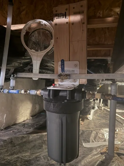 Water filtration system installed with bypass valve