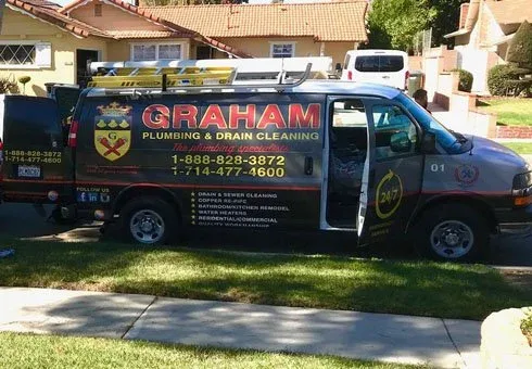 Graham Plumbing service van at a job