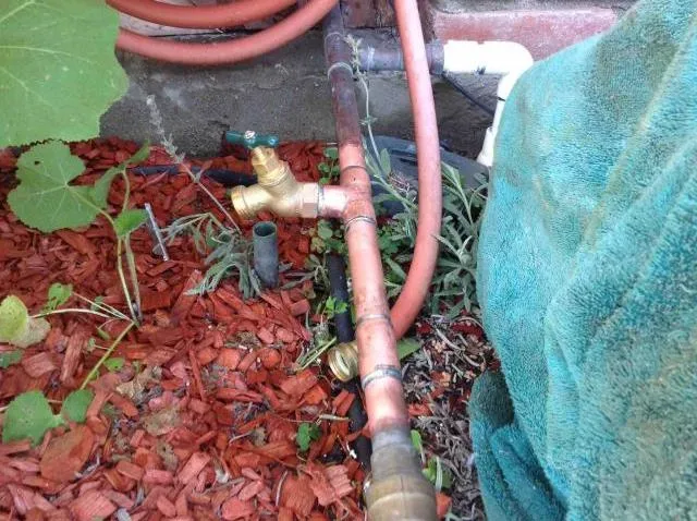 Outdoor copper pipe and hose bib work by Graham Plumbing
