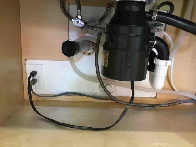 Garbage disposal replacement by Graham Plumbing