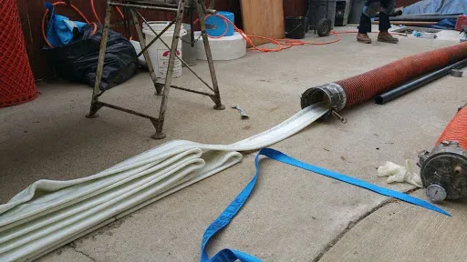 Pipe liner being installed by Graham Plumbing