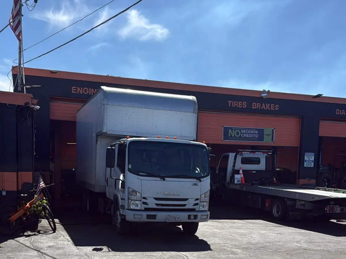 Box truck in the shop lot for service