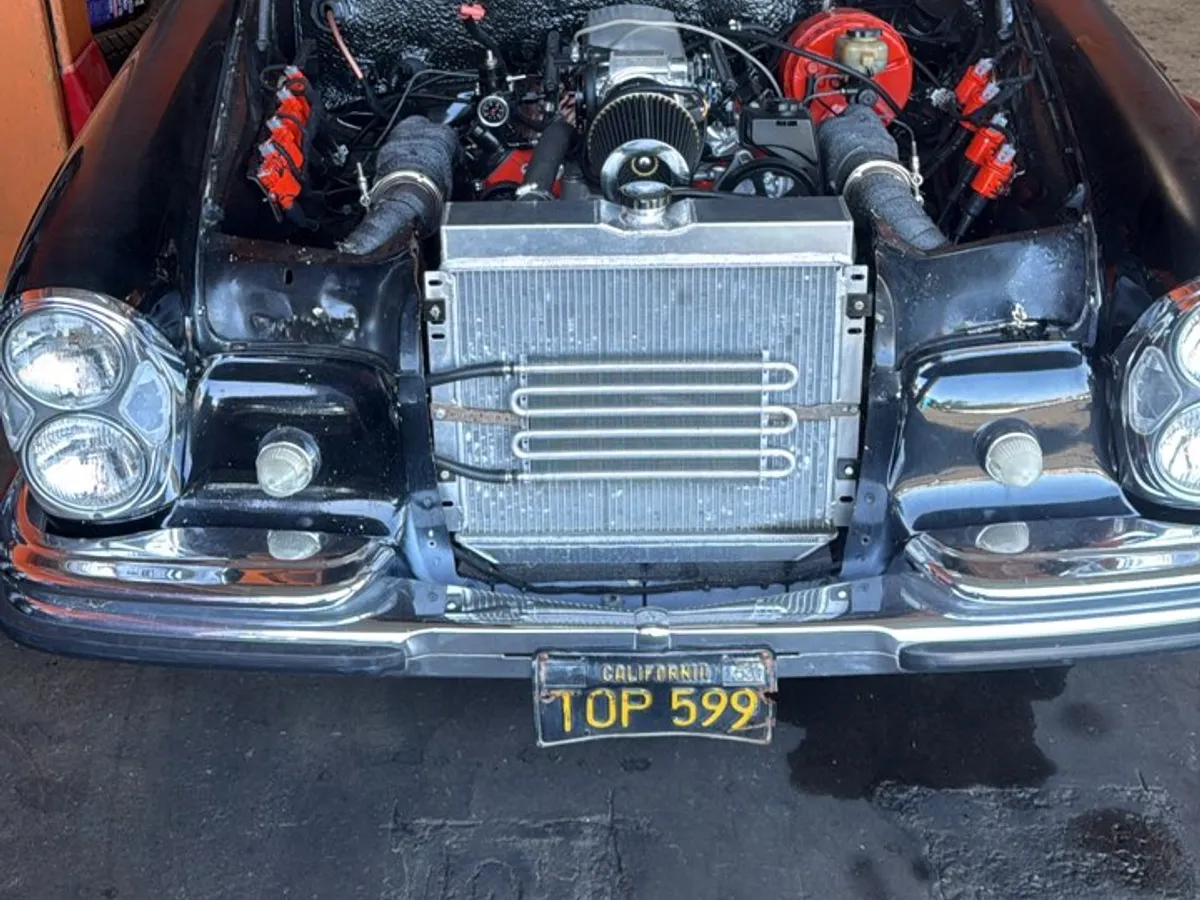 Classic car engine bay on the shop floor