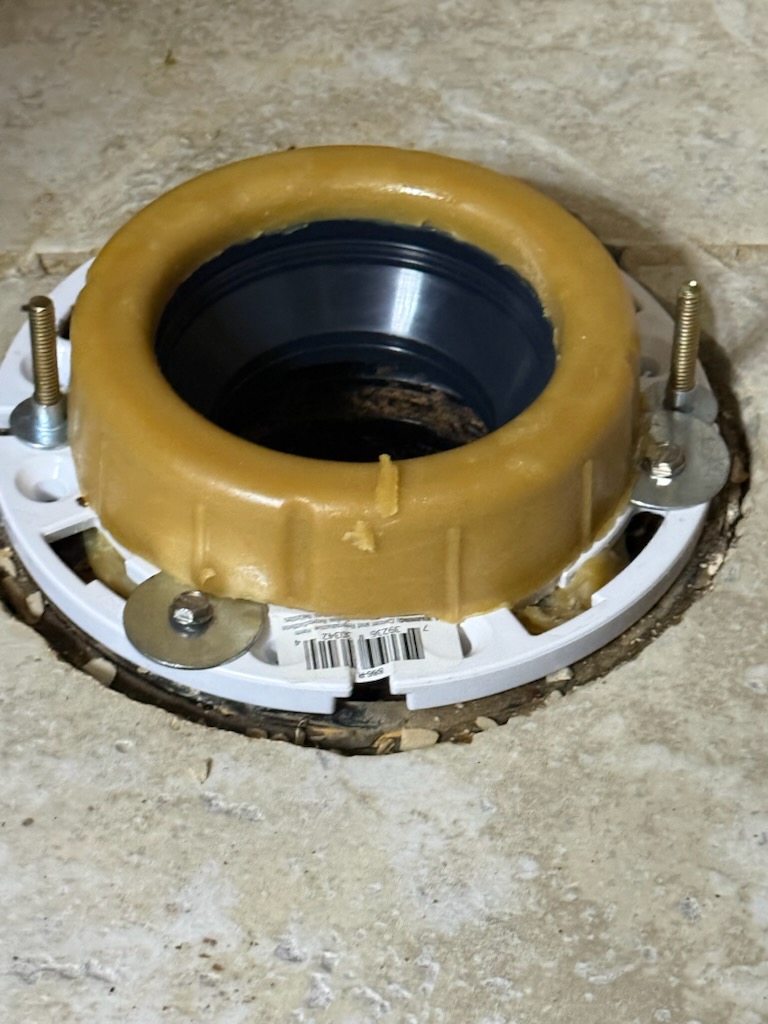 Toilet replacement and toilet flange repair completed by Twin City Pipeworks in Oak Park Heights, MN