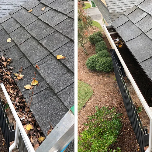 Gutter cleaning and debris removal on a residential home