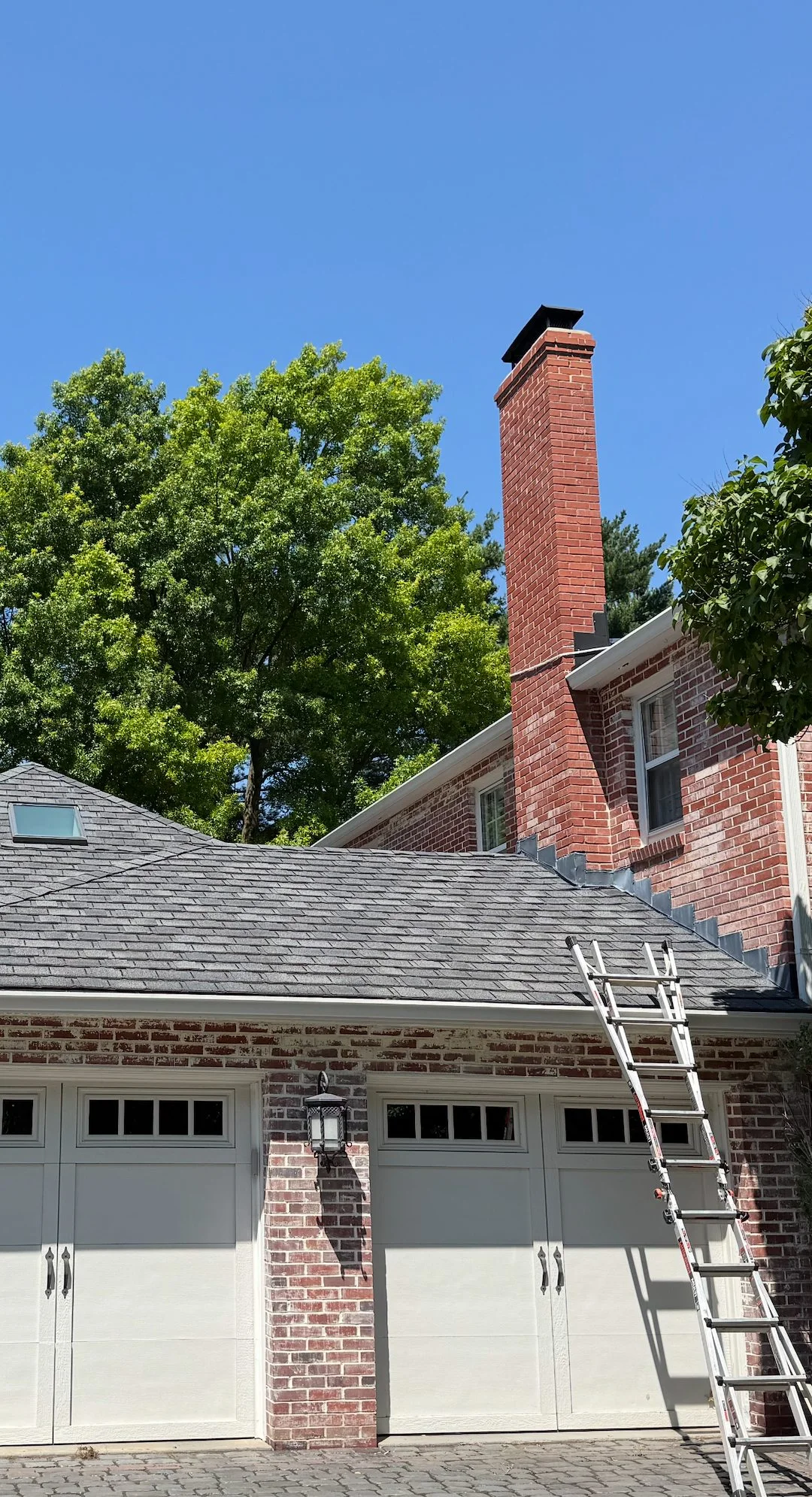 Residential brick home in Bellevue Nebraska Blackhawk neighborhood with freshly cleaned windows and exterior after Frontline Home Services visit