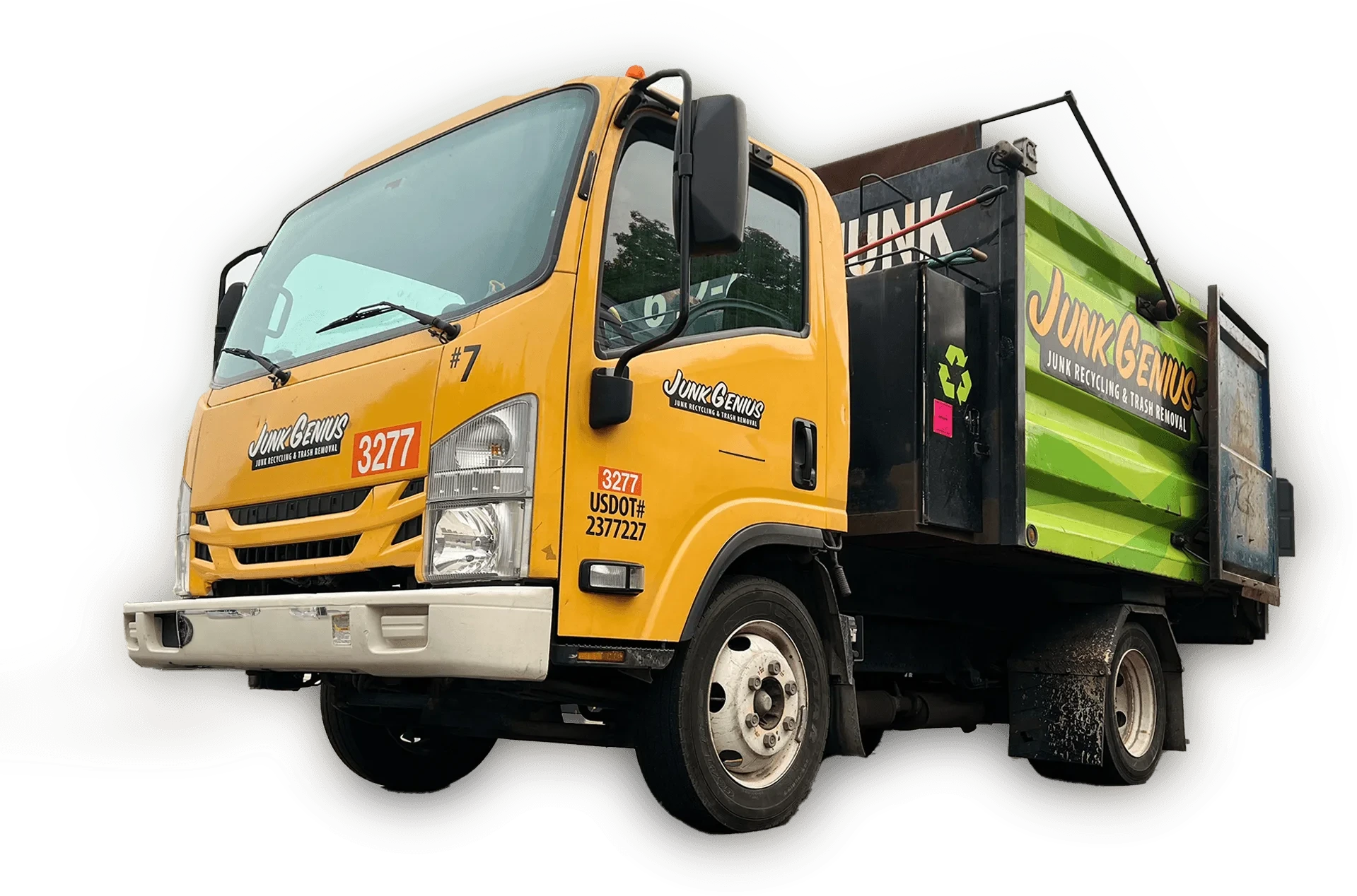 Junk Genius truck with its green branded box and open cargo bed