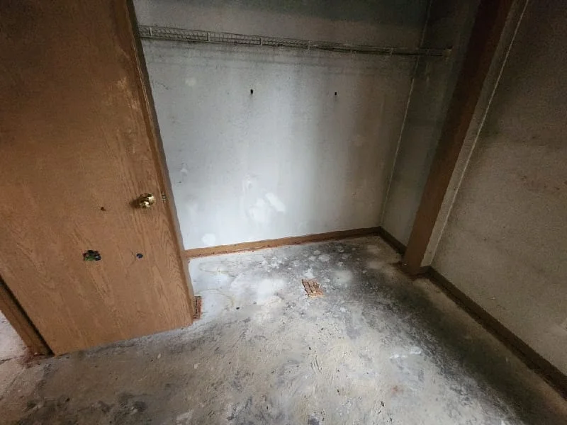 Empty room clearance and junk removal service shown in an unfinished interior space during work-in-progress.