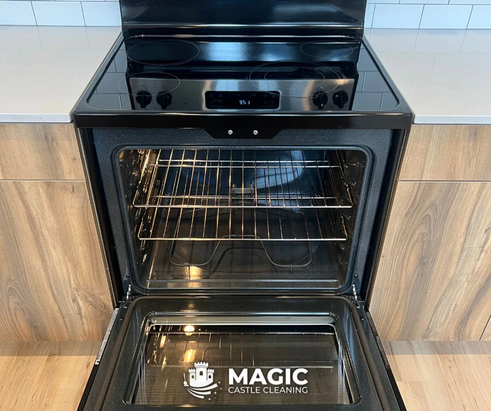 Oven cleaned inside and out, with a clear glass door and a sparkling electric range.