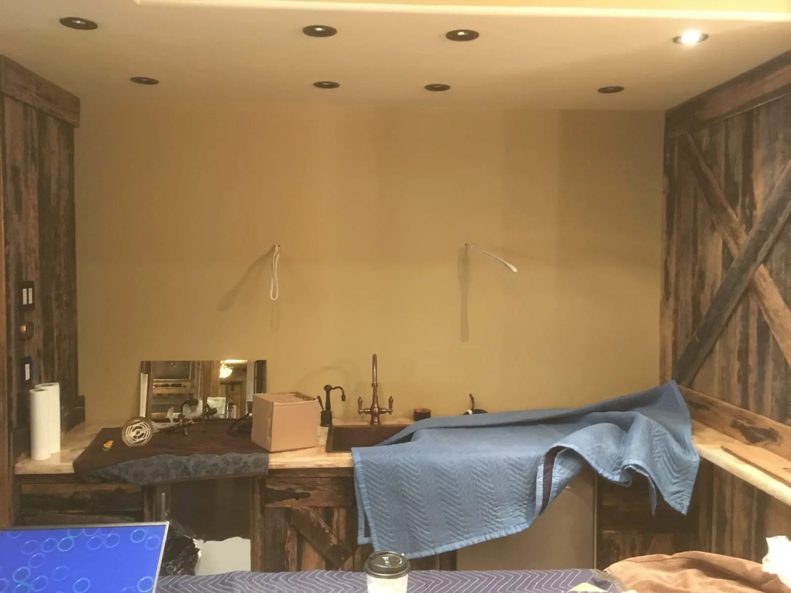 Bar wall with lit glass shelves
