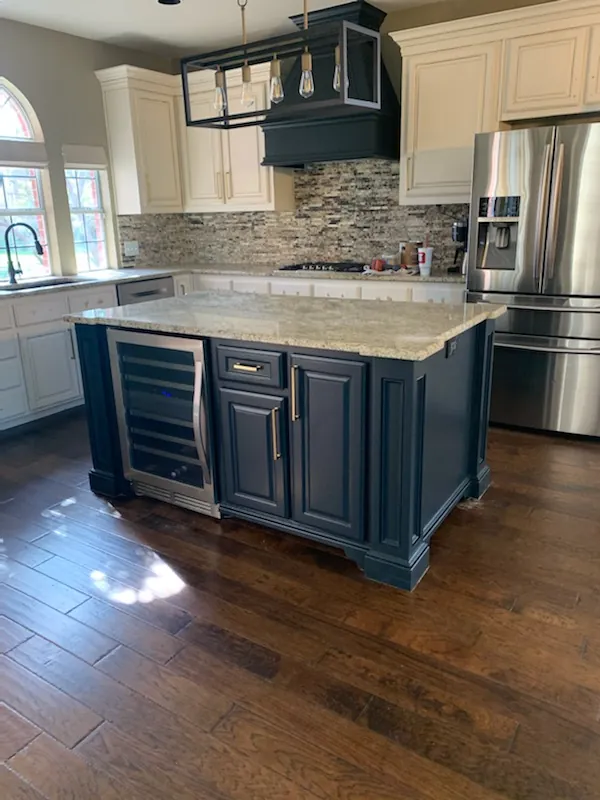 Kitchen with a painted blue island