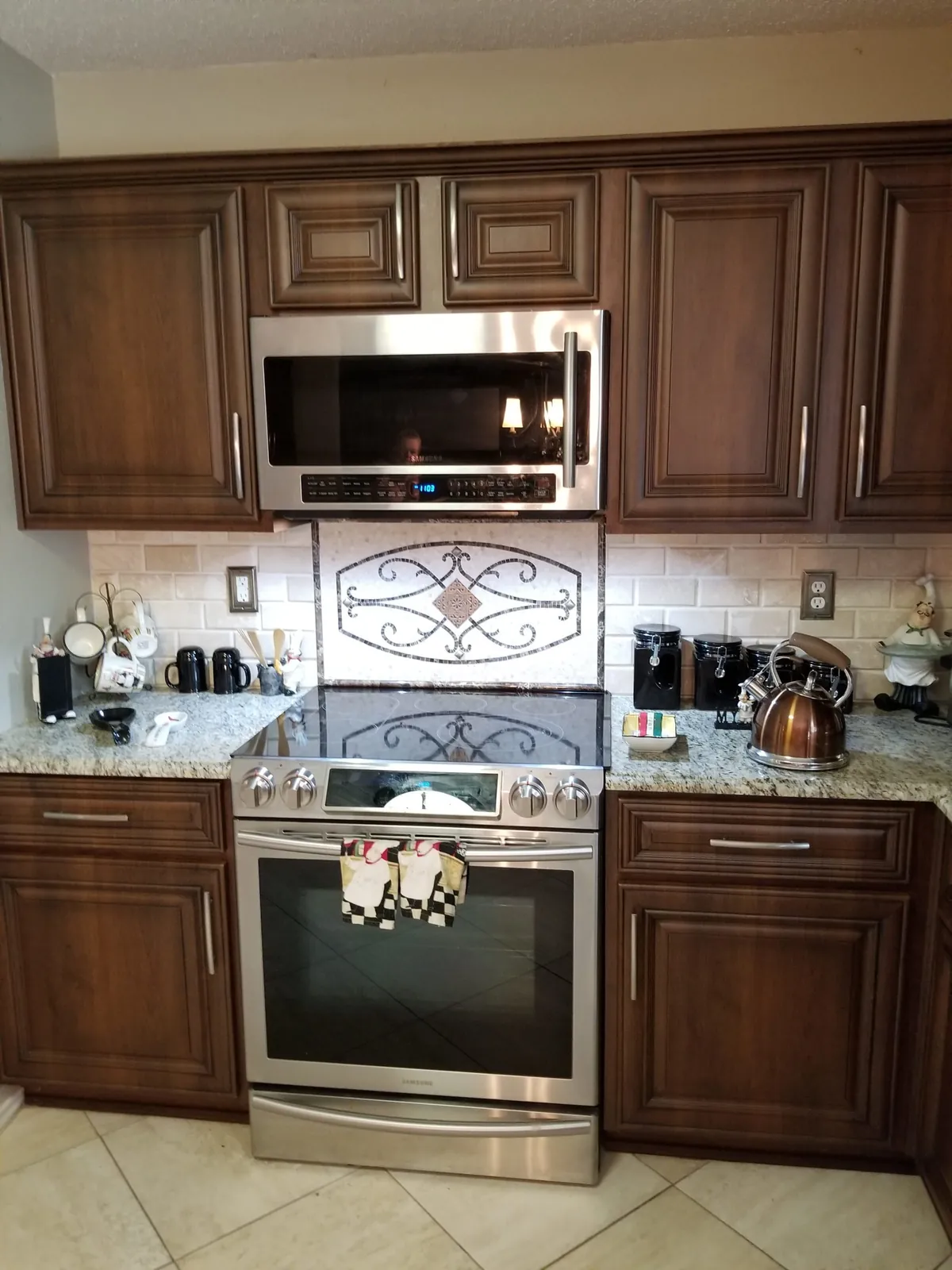 Tile backsplash behind a range