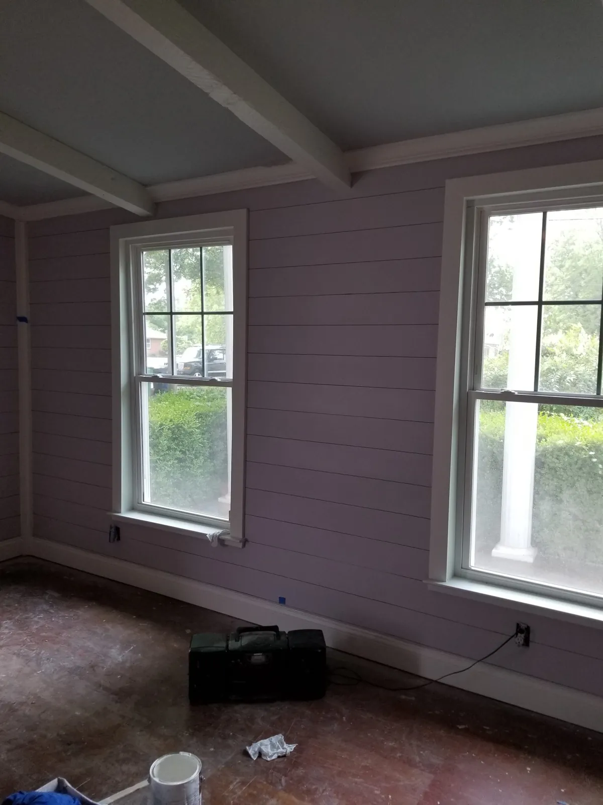 Room finished with painted shiplap walls