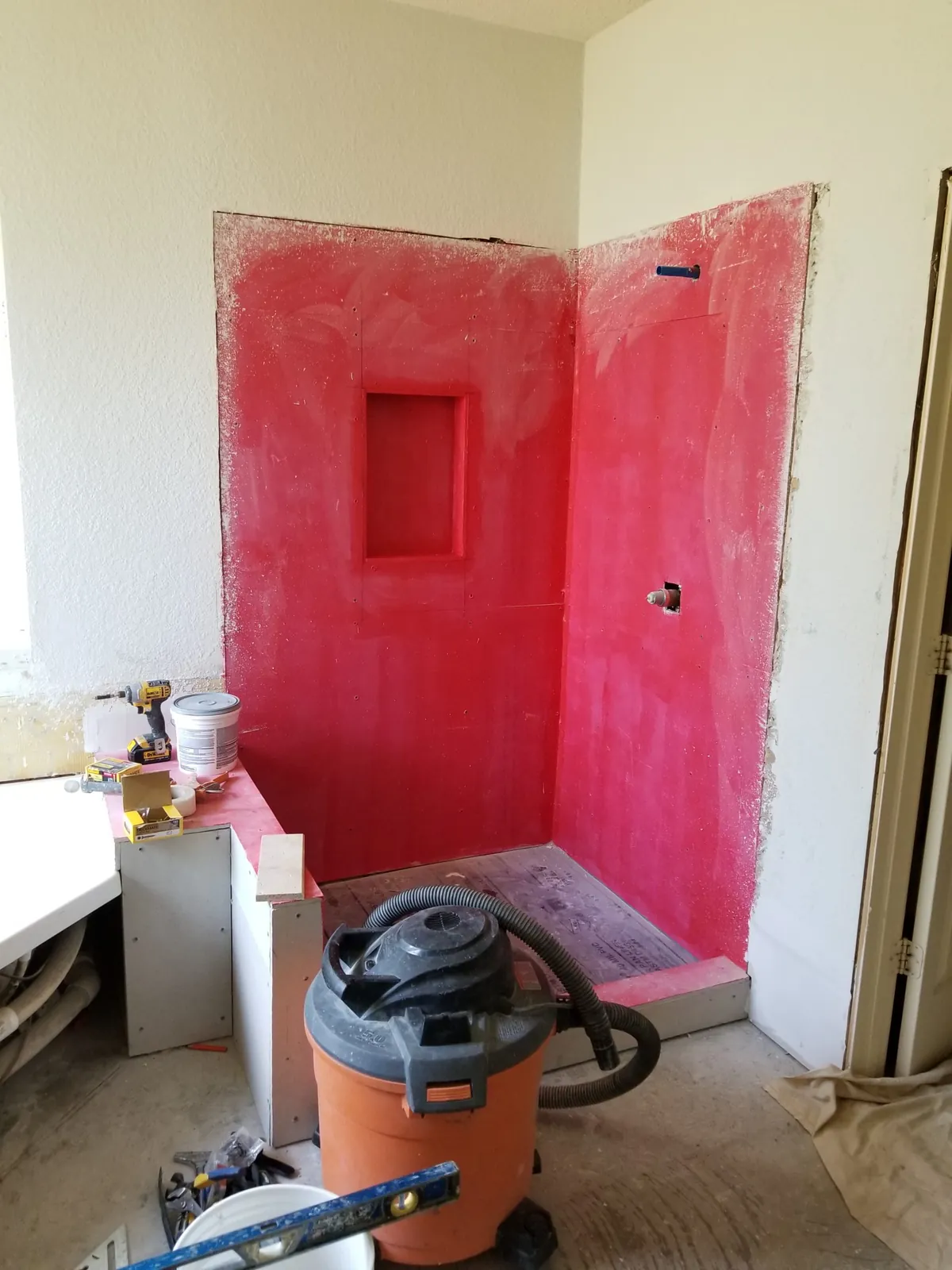 Shower walls with waterproofing membrane before tile