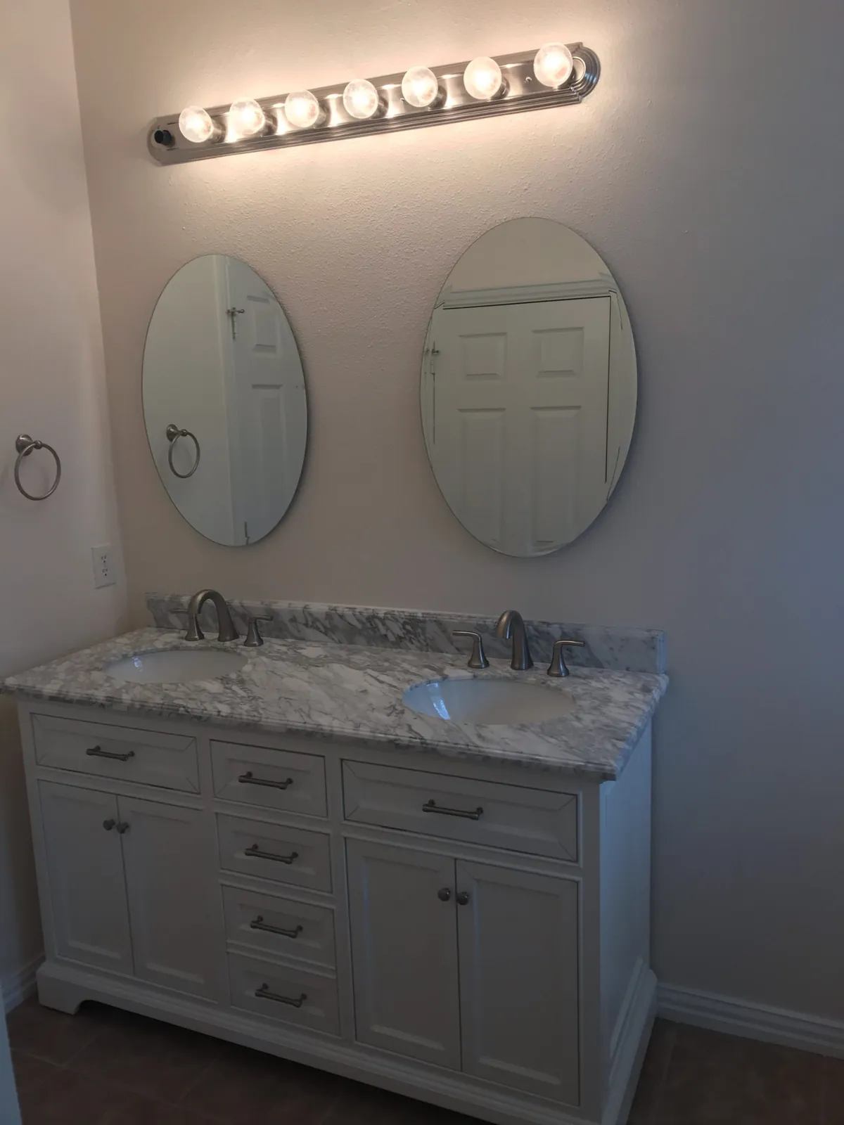 Double vanity with new mirrors and light bar