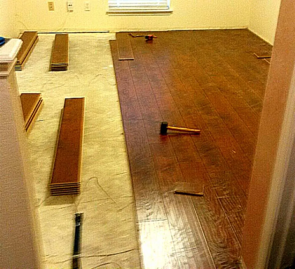 Wood floor going down in a bedroom