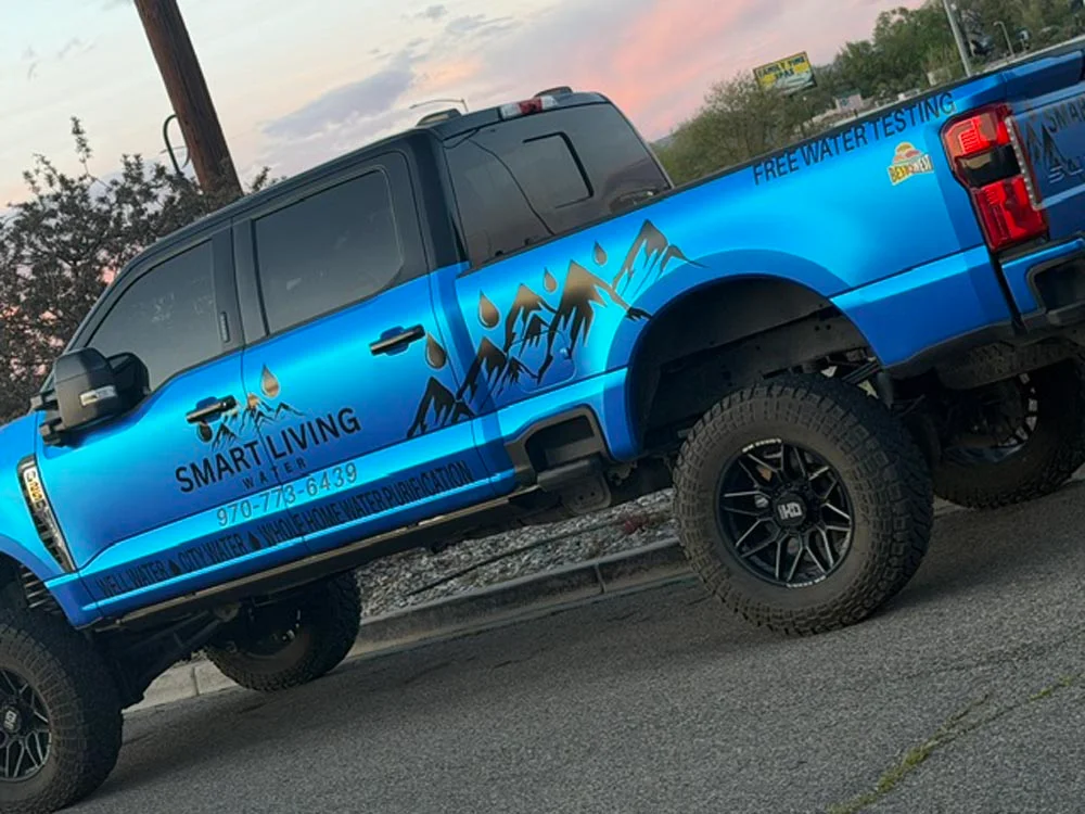 Smart Living Water branded service vehicle used for free water tests and installations across Grand Junction and Mesa County